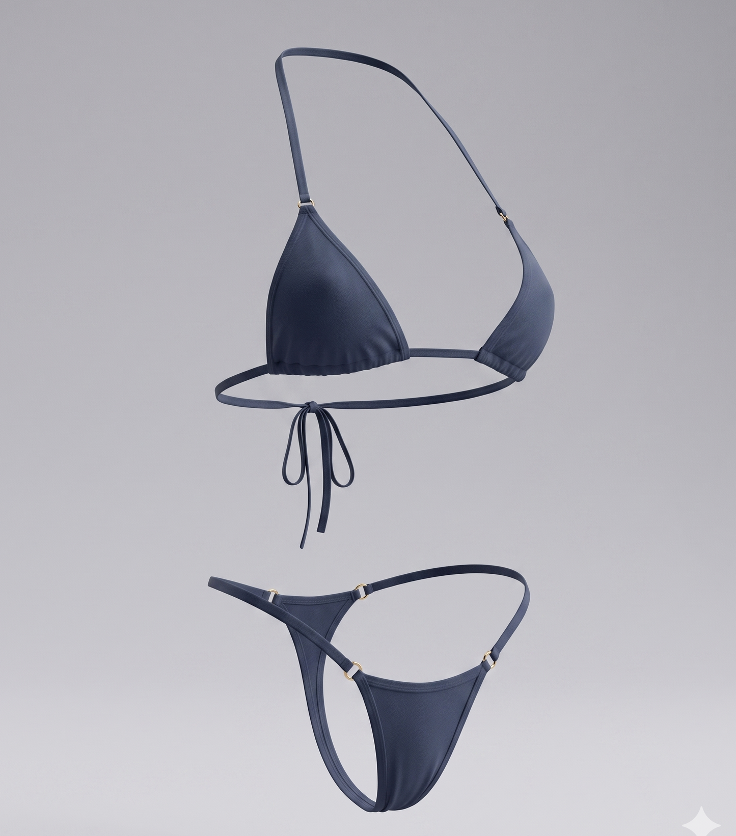 Navy blue bikini set on a gray background